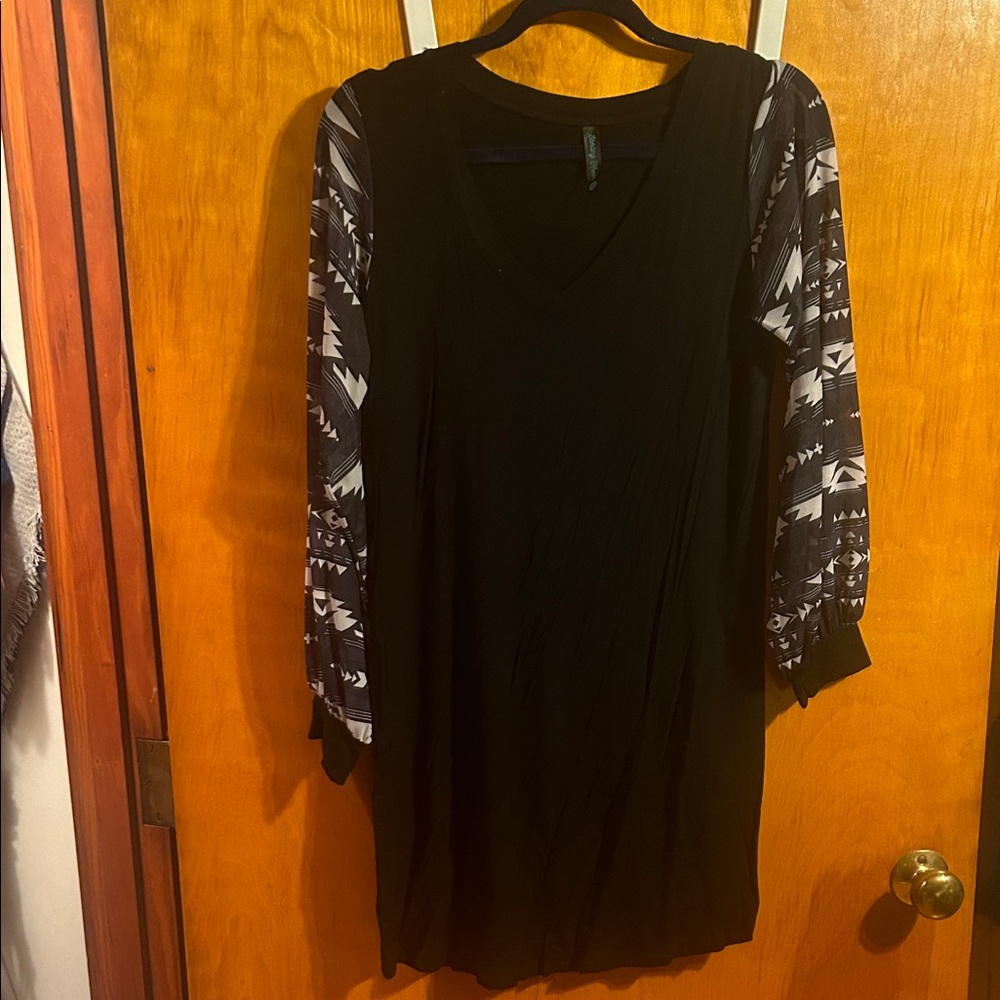 Chic Black Dress with Patterned Sleeves